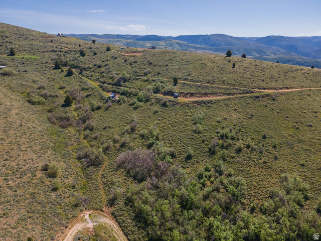 3325 North Oak Cyn Road, Unit 490 Huntsville, UT 84317 - Photo 20 of 25 Expansive hillside terrain featuring natural vegetation and distant mountain ranges
