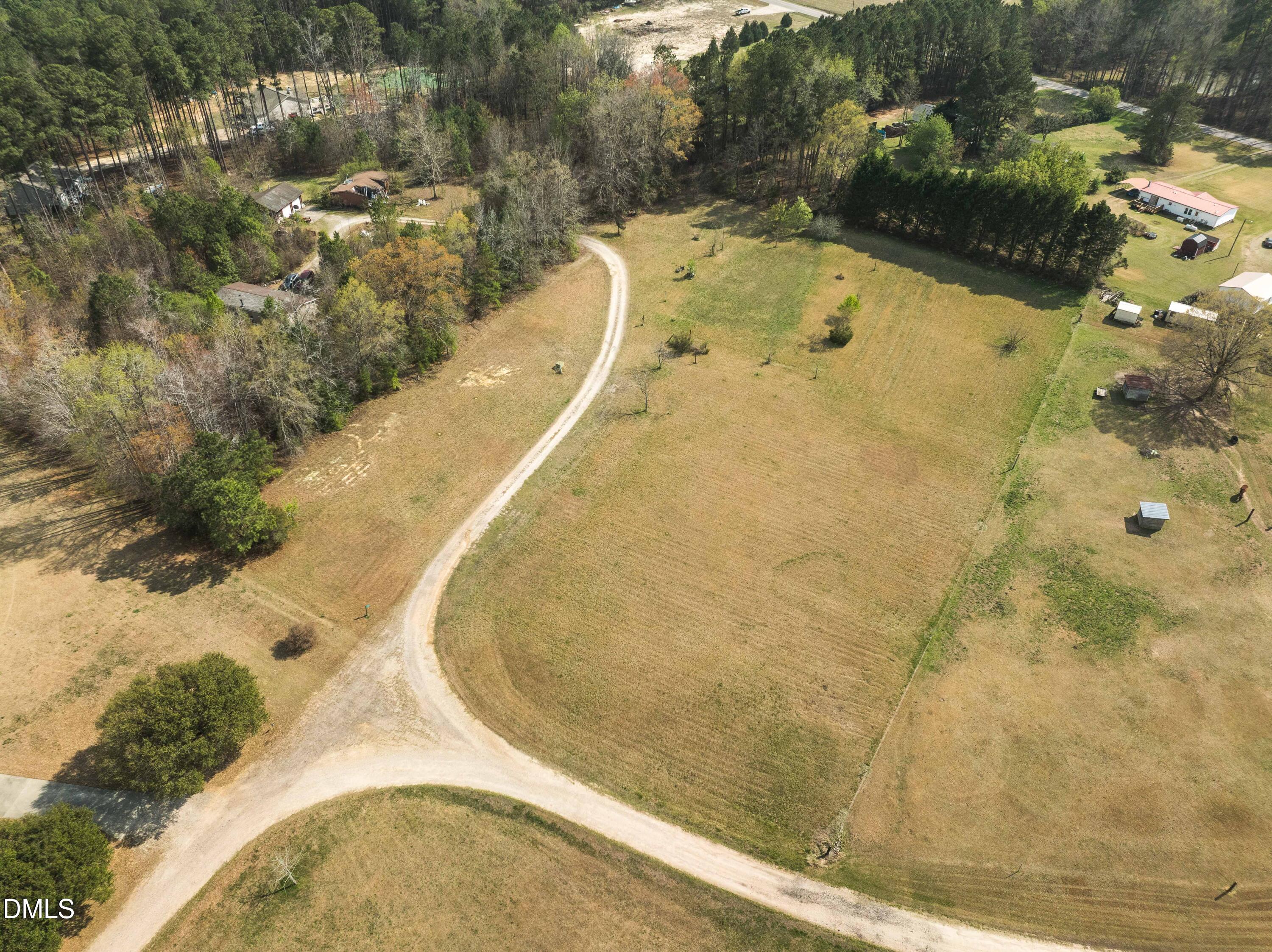 96 Meredith Lane Zebulon, NC 27597 - Photo 8 of 13 a view of outdoor space and swimming pool