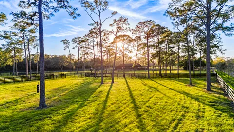 a view of a swimming pool with an outdoor space and seating area