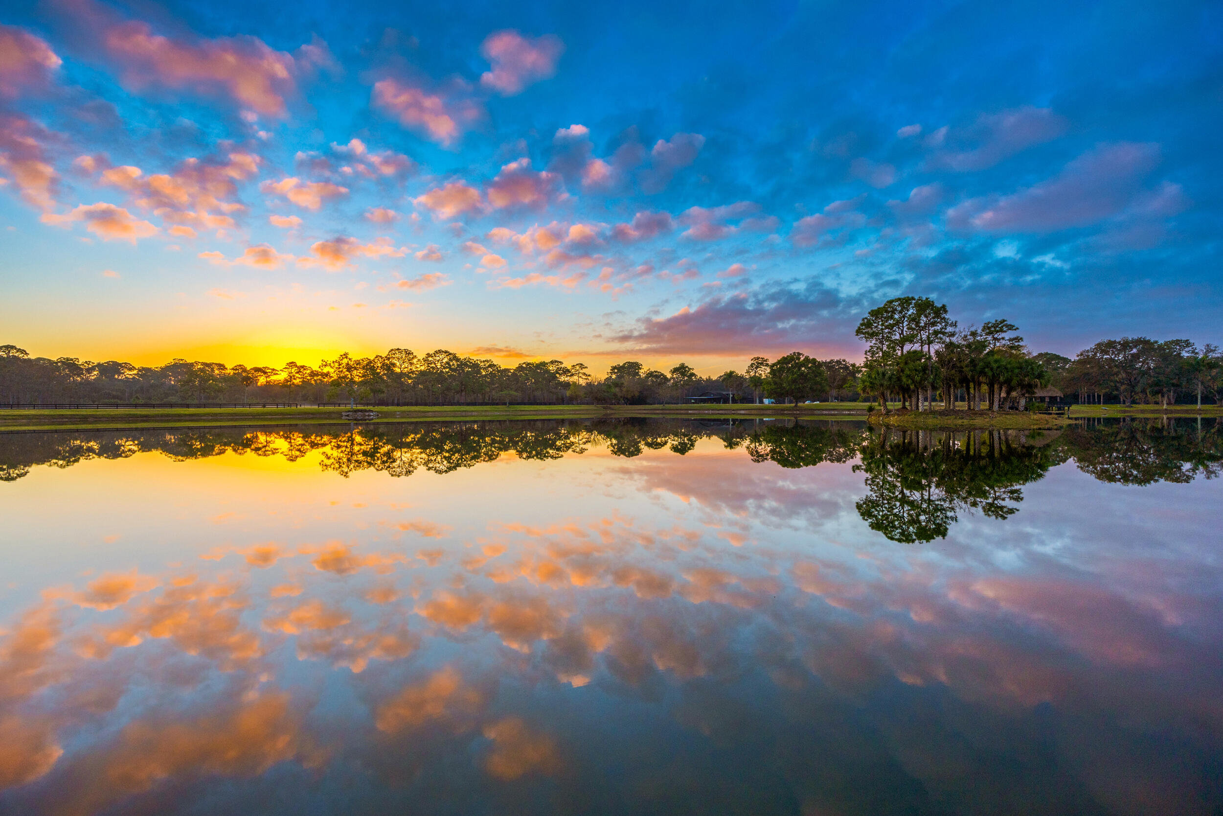 20000 Mack Dairy Road Jupiter, FL 33478 - Photo 16 of 32 a view of a lake with houses in background