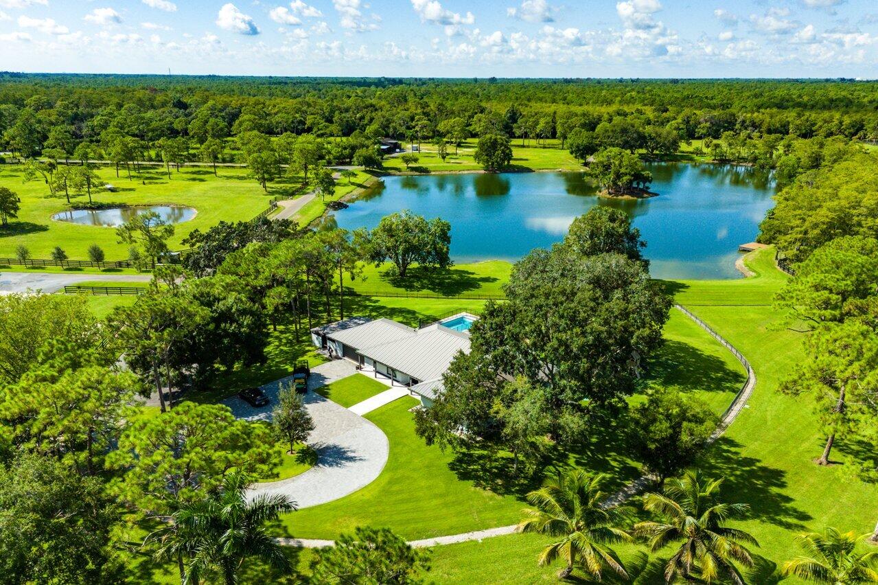 20000 Mack Dairy Road Jupiter, FL 33478 - Photo 32 of 32 a view of a lake with a yard
