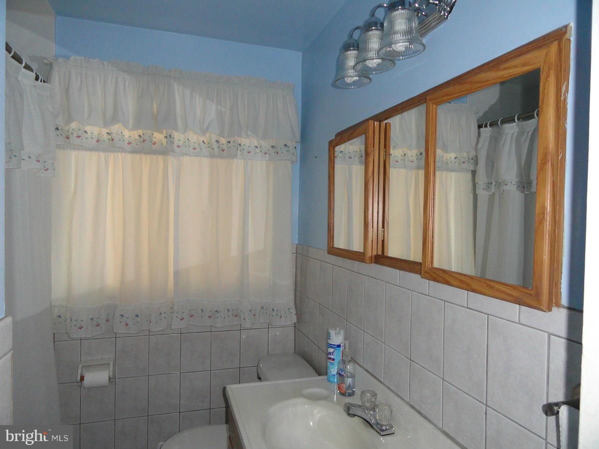 7833 Scholar Road Baltimore, MD 21222 - Photo 14 of 30 Full Bath on Bedroom Level recently Remodeled