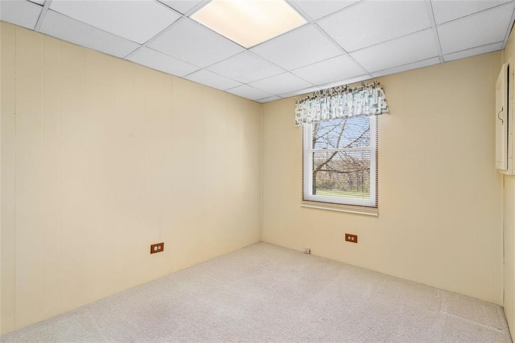 413 Pittsburgh Street New Derry, PA 15671 - Photo 16 of 23 a view of an empty room with a window