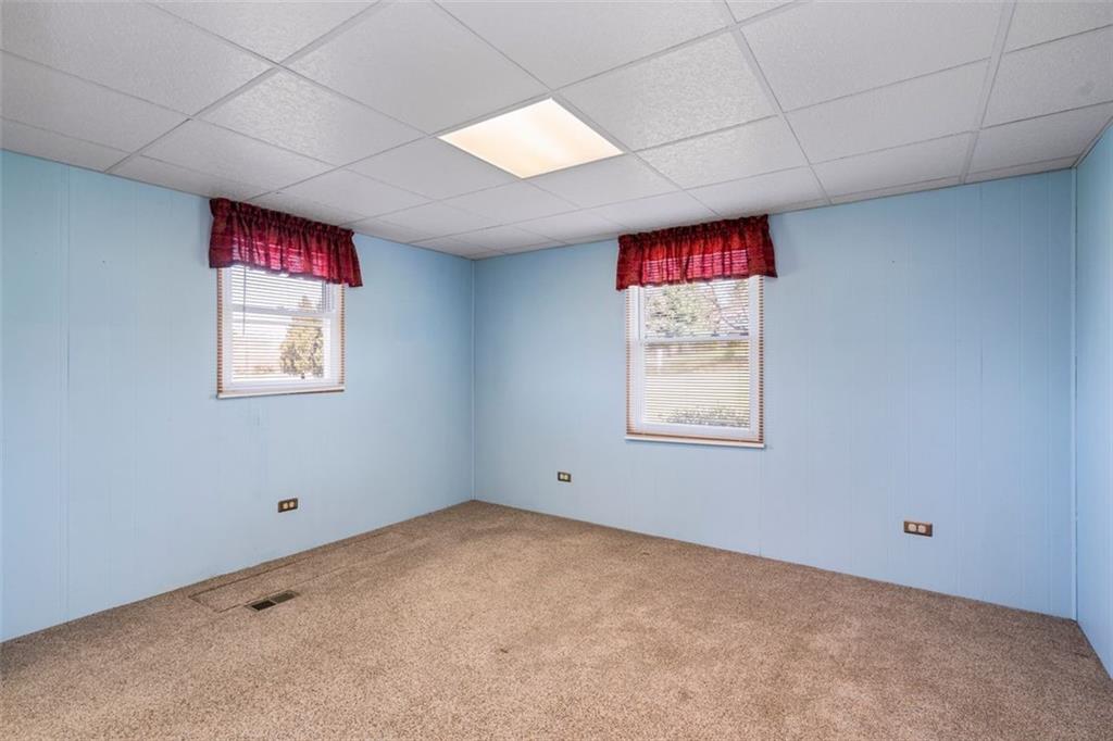 413 Pittsburgh Street New Derry, PA 15671 - Photo 18 of 23 a view of an empty room with a window