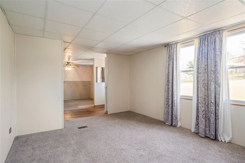 413 Pittsburgh Street New Derry, PA 15671 - Photo 4 of 23 an empty room with windows