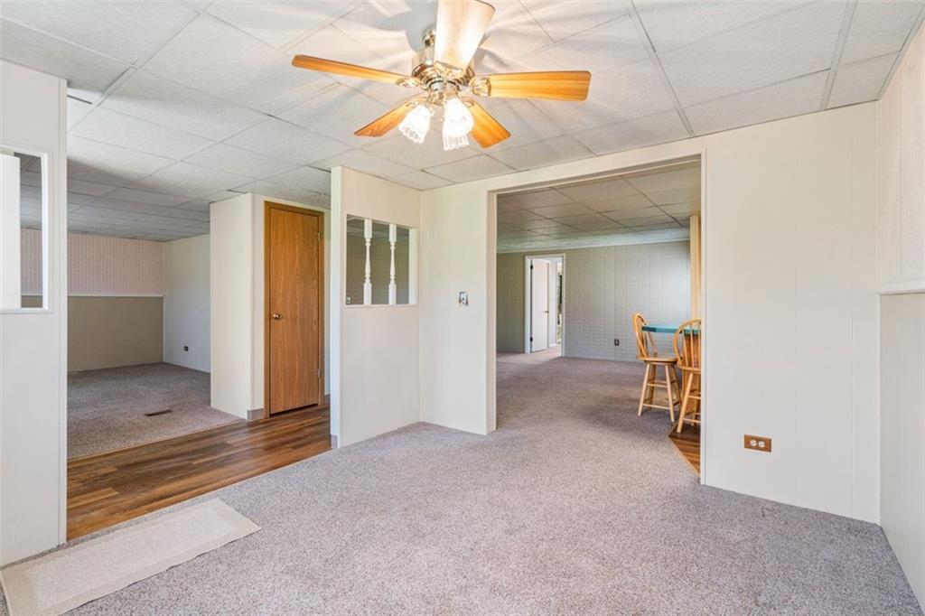 413 Pittsburgh Street New Derry, PA 15671 - Photo 5 of 23 an empty room with closet and a chandelier fan