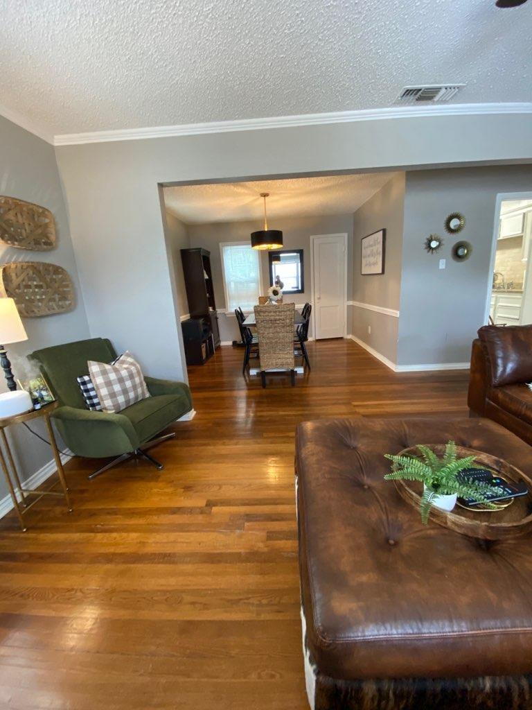 2514 29th Street Lubbock, TX 79410 - Photo 3 of 8 a living room with furniture and a table