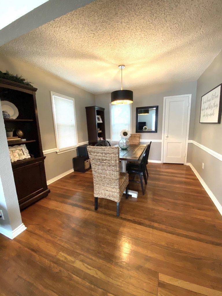 2514 29th Street Lubbock, TX 79410 - Photo 4 of 8 a living room with furniture and wooden floor