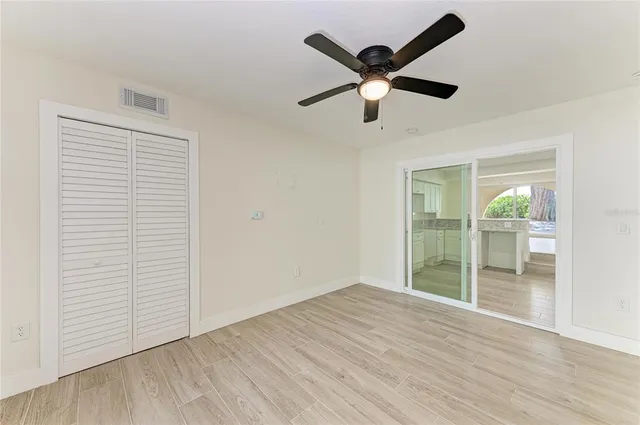 a living room with furniture rug and window