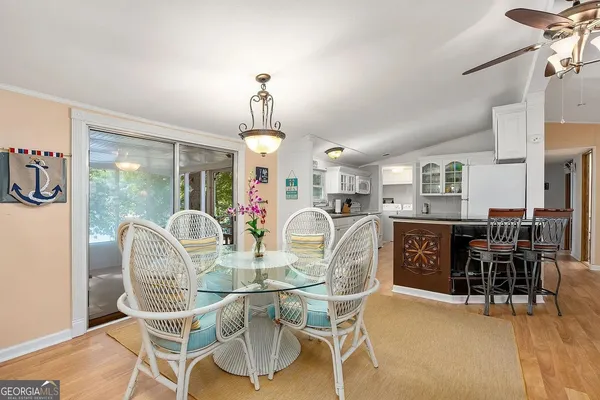 a view of a dining room with furniture