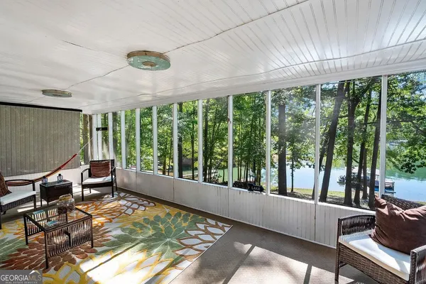 a living room with large windows