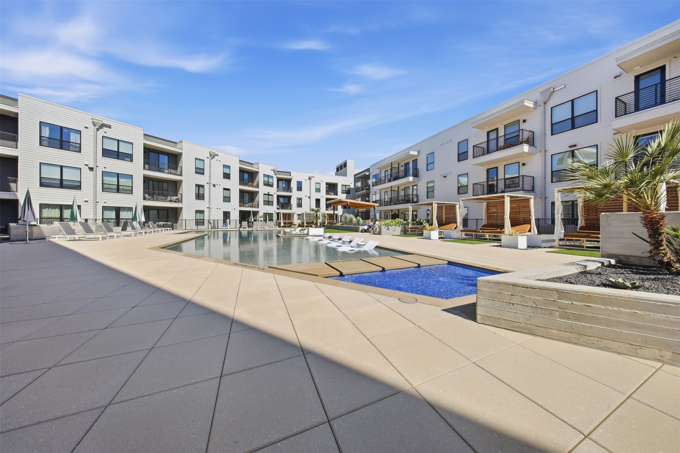 1701 Simond Avenue, Unit 615 Austin, TX 78723 - Photo 15 of 25 a swimming pool with outdoor seating and yard
