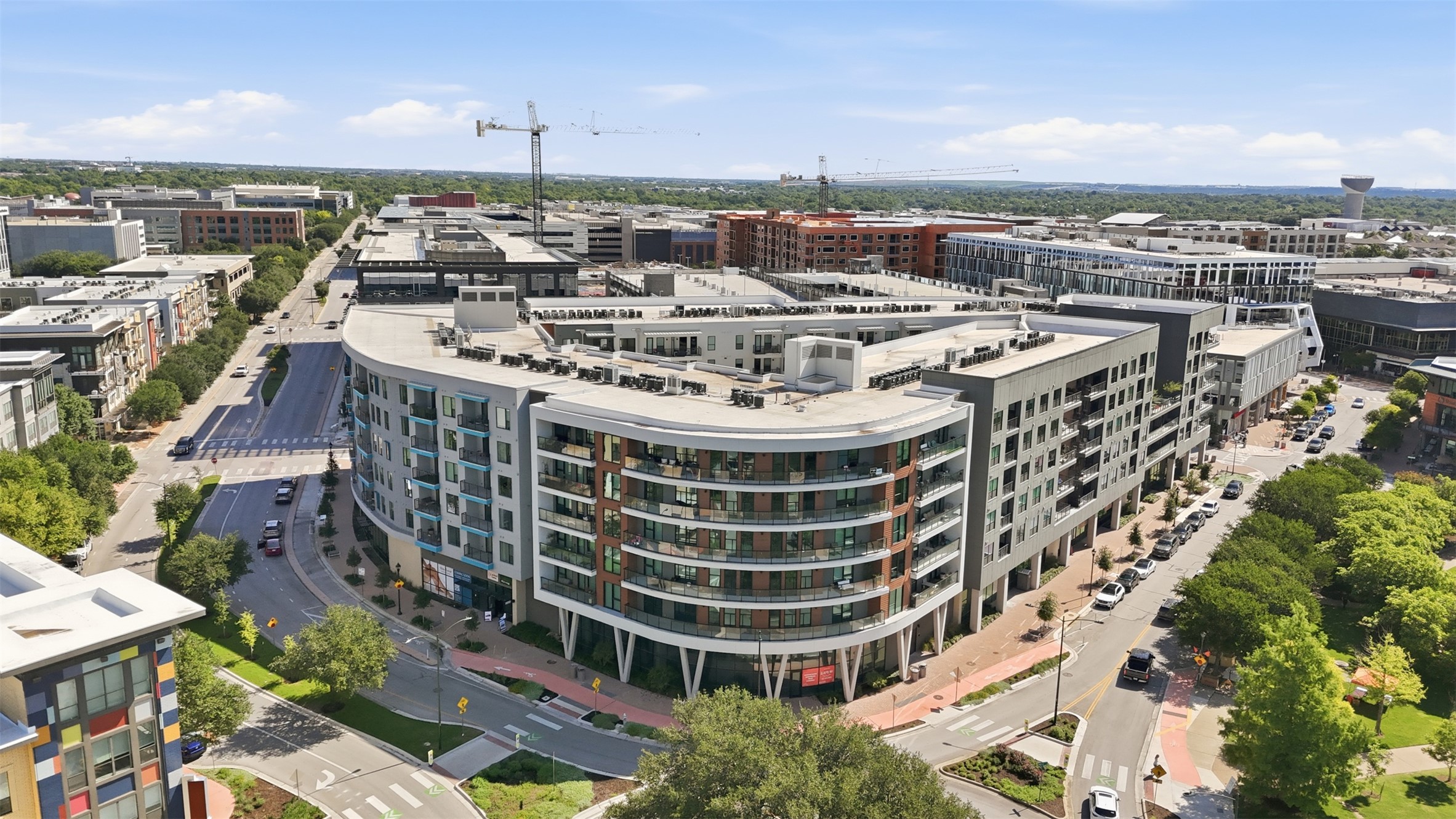 1701 Simond Avenue, Unit 615 Austin, TX 78723 - Photo 20 of 25 a large building with a city view