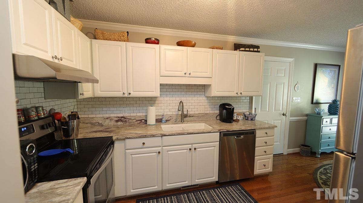 6487 Applewhite Road Wendell, NC 27591 - Photo 14 of 29 Another view of additional cabinets