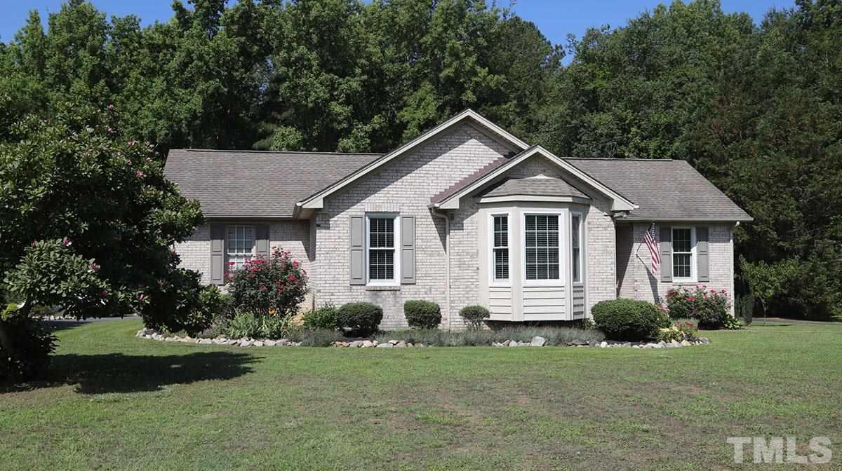 6487 Applewhite Road Wendell, NC 27591 - Photo 3 of 29 Set among hardwood trees