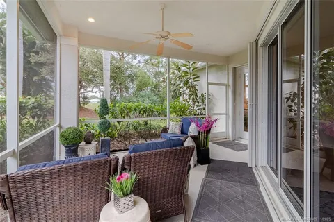a view of a porch with furniture