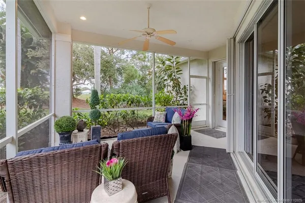 a view of a porch with furniture