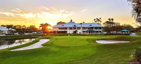 a view of swimming pool with outdoor space and seating area