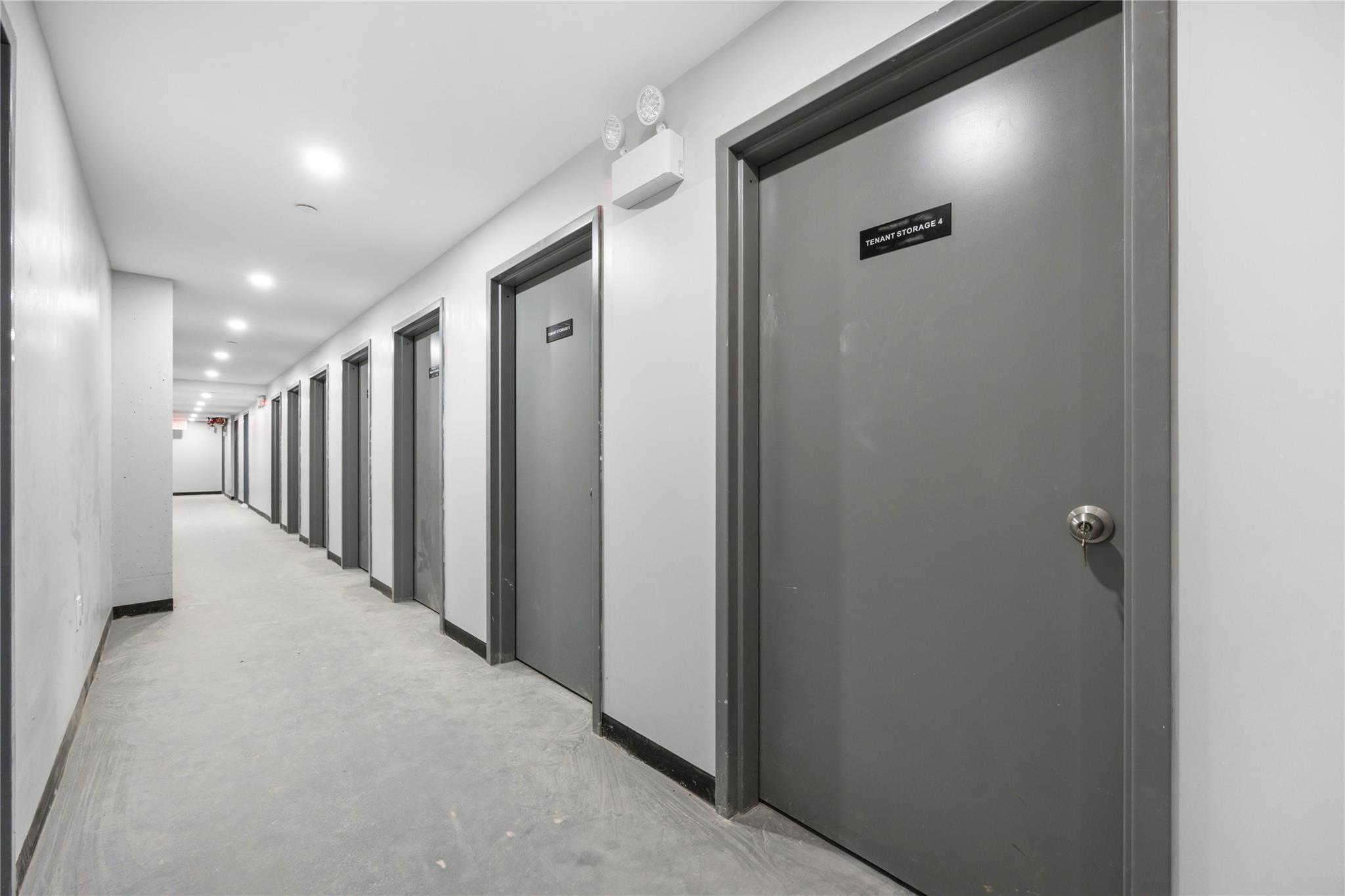 163-07 72nd Avenue, Unit 2C Queens, NY 11365 - Photo 13 of 14 Hallway featuring concrete floors, baseboards, and recessed lighting