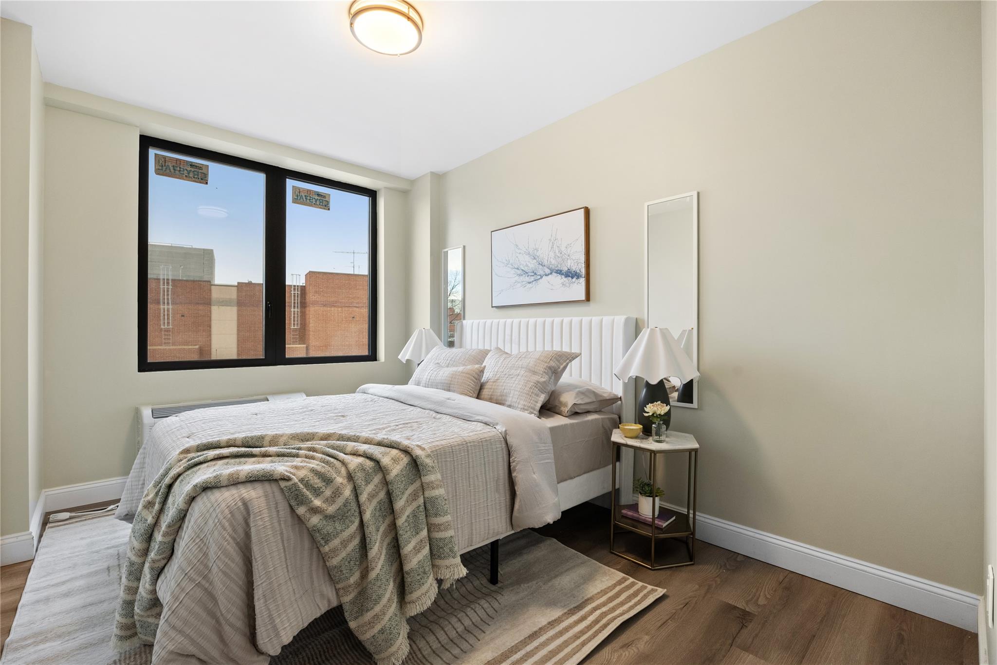 163-07 72nd Avenue, Unit 2C Queens, NY 11365 - Photo 9 of 14 Bedroom with baseboards and wood finished floors