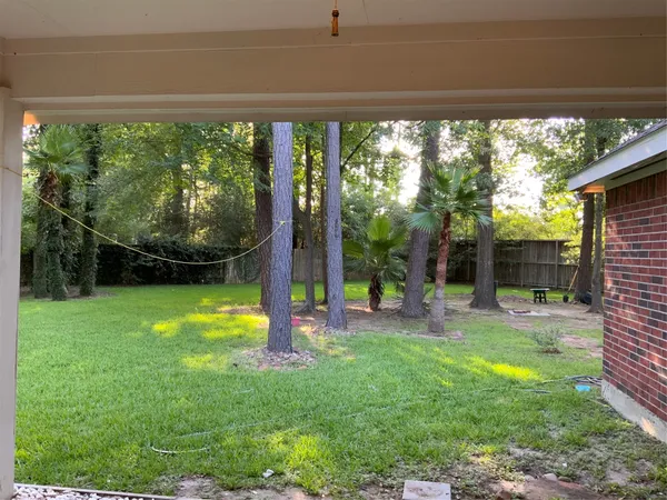 a view of a porch with a yard