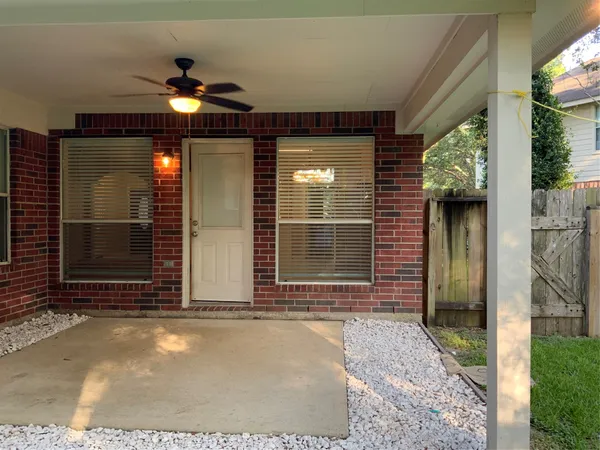 a view of empty room with windows
