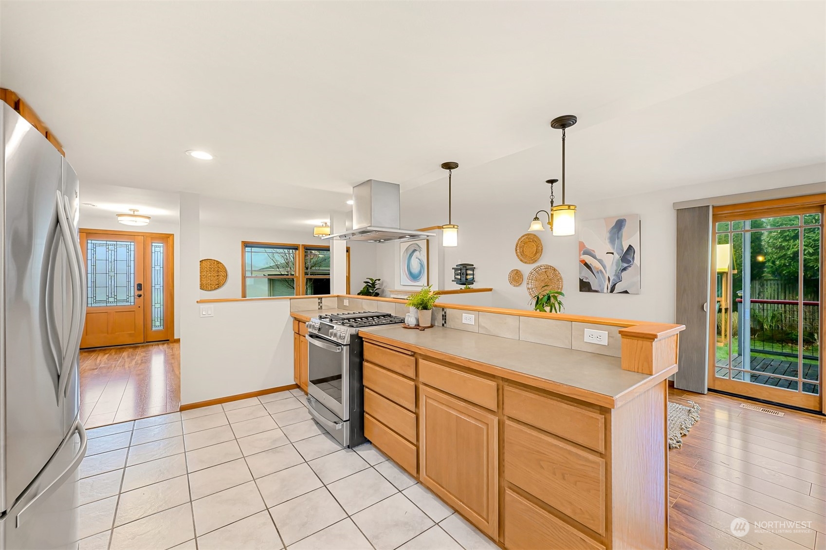 2400 View Ridge Drive Bellingham, WA 98229 - Photo 15 of 39 a view of living room with stainless steel appliances granite countertop furniture and a kitchen view