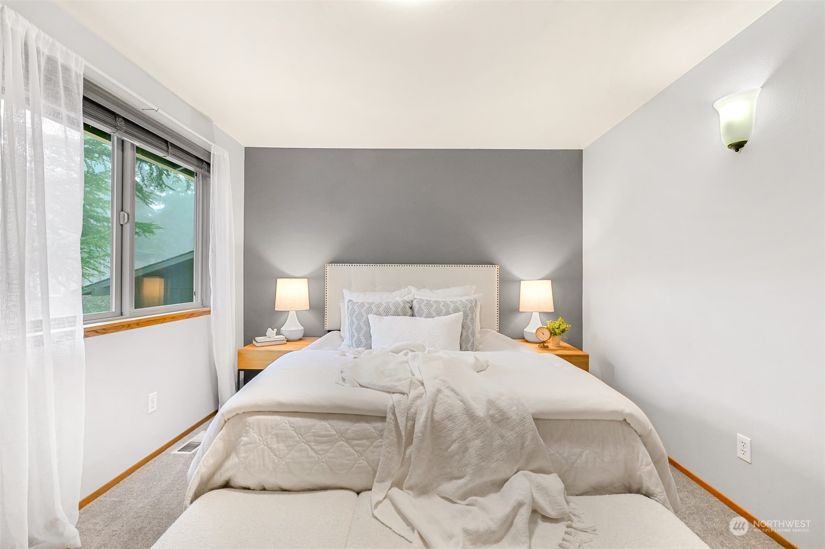 2400 View Ridge Drive Bellingham, WA 98229 - Photo 21 of 39 a bedroom with a bed and wooden floor