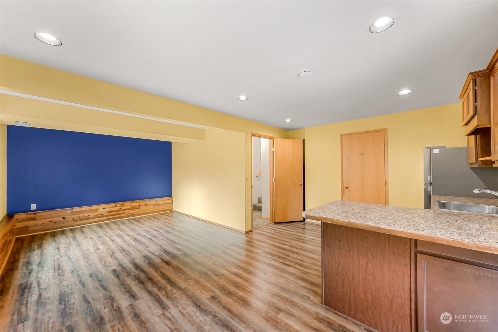 2400 View Ridge Drive Bellingham, WA 98229 - Photo 28 of 39 a view of a kitchen with a sink and a wooden floor