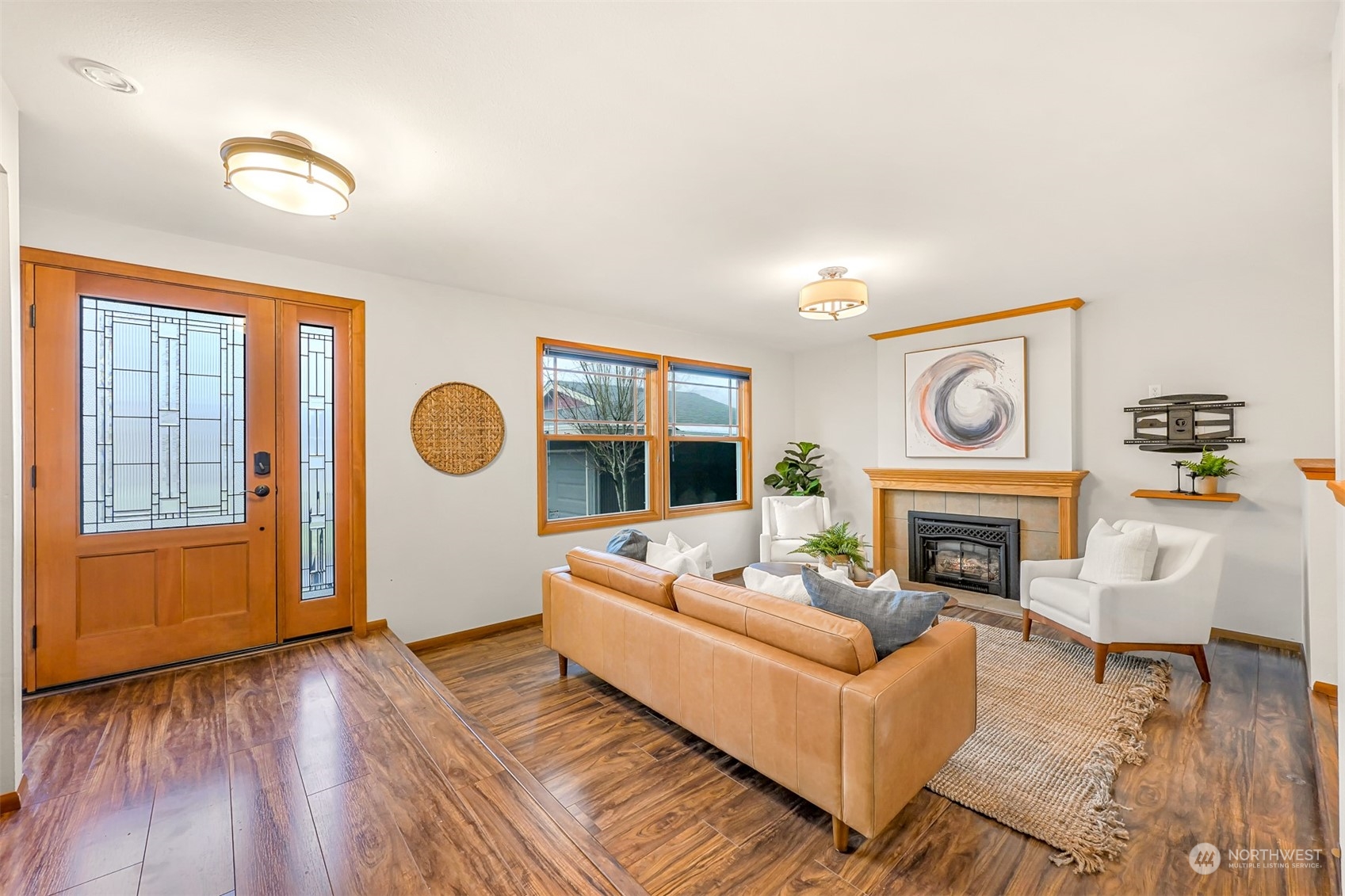 2400 View Ridge Drive Bellingham, WA 98229 - Photo 5 of 39 a living room with furniture and a fireplace