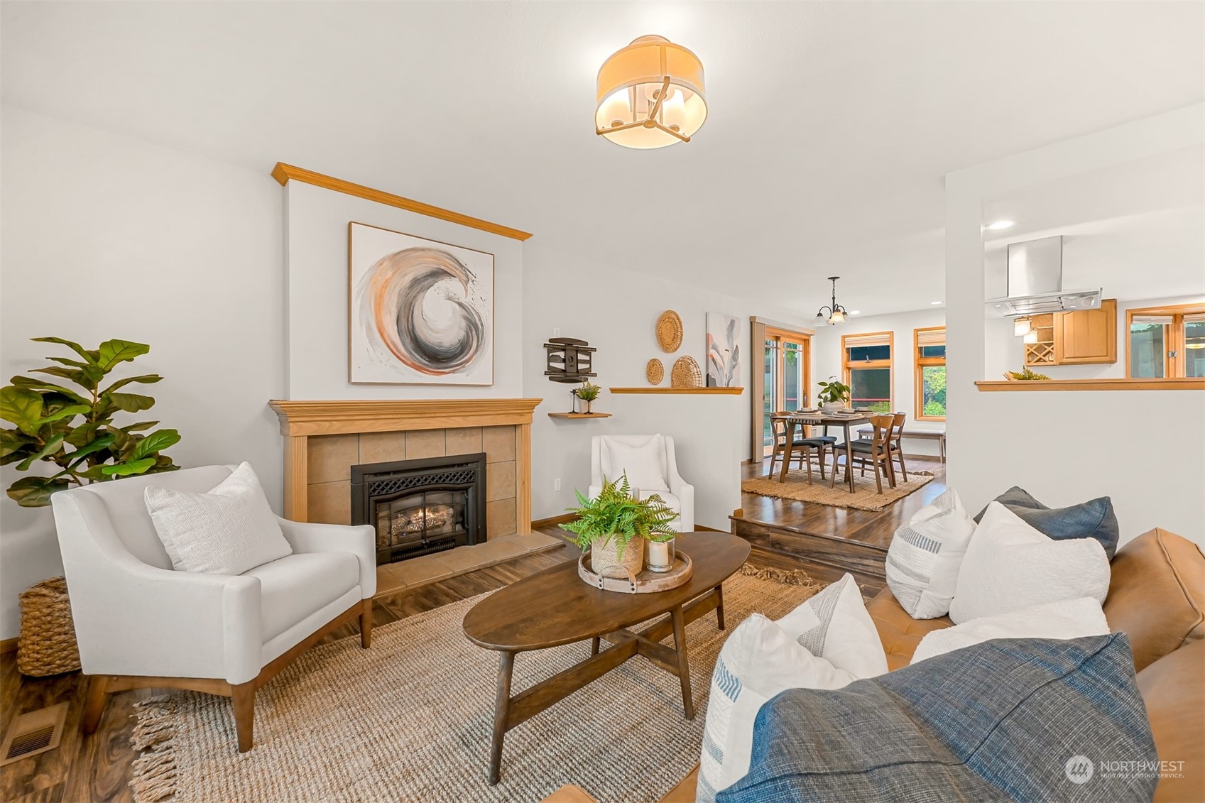 2400 View Ridge Drive Bellingham, WA 98229 - Photo 7 of 39 a living room with furniture a fireplace and a table