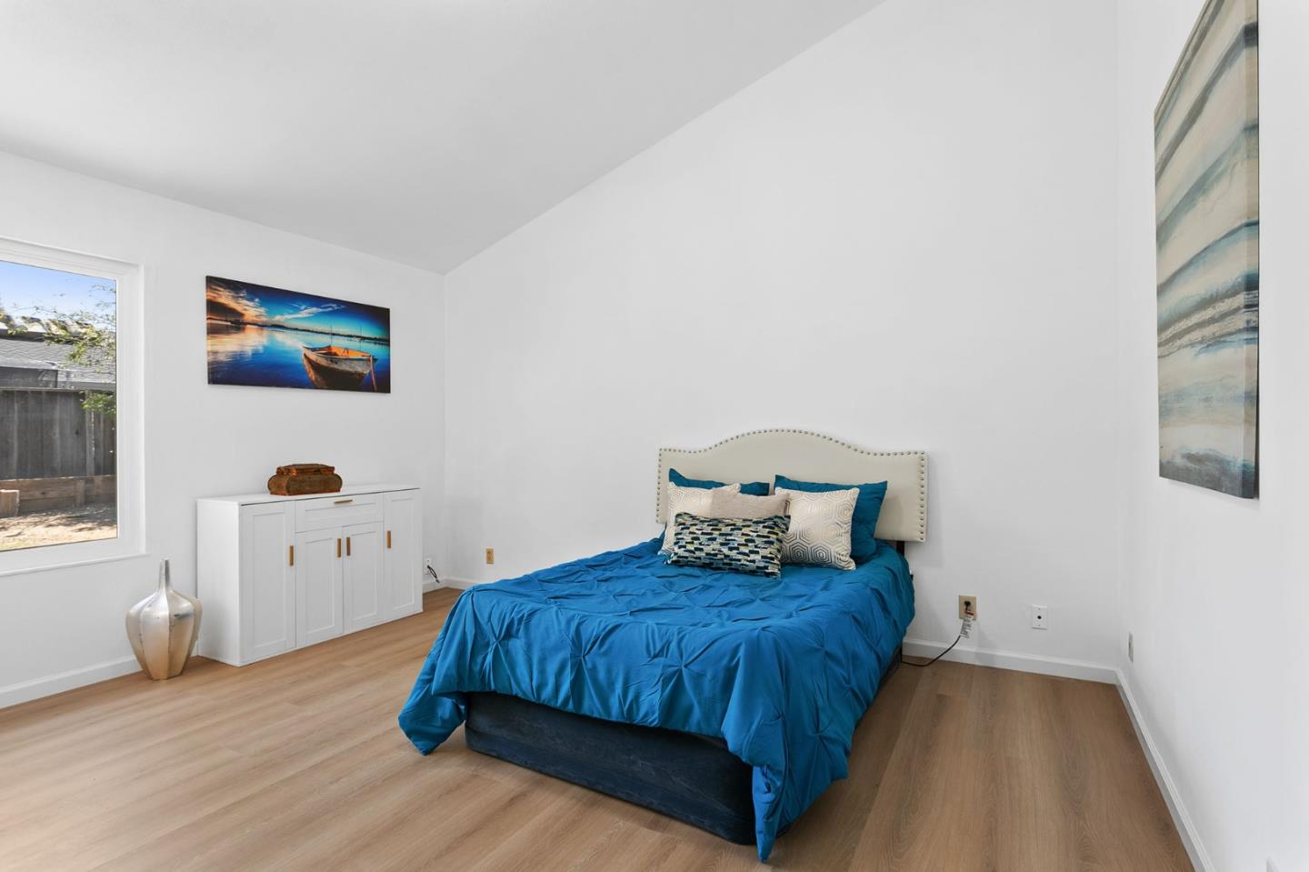 2962 Tuers Road San Jose, CA 95121 - Photo 18 of 38 a spacious bedroom with a bed and a window