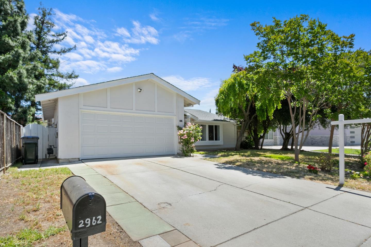 2962 Tuers Road San Jose, CA 95121 - Photo 2 of 38 a backyard of a house with table and chairs