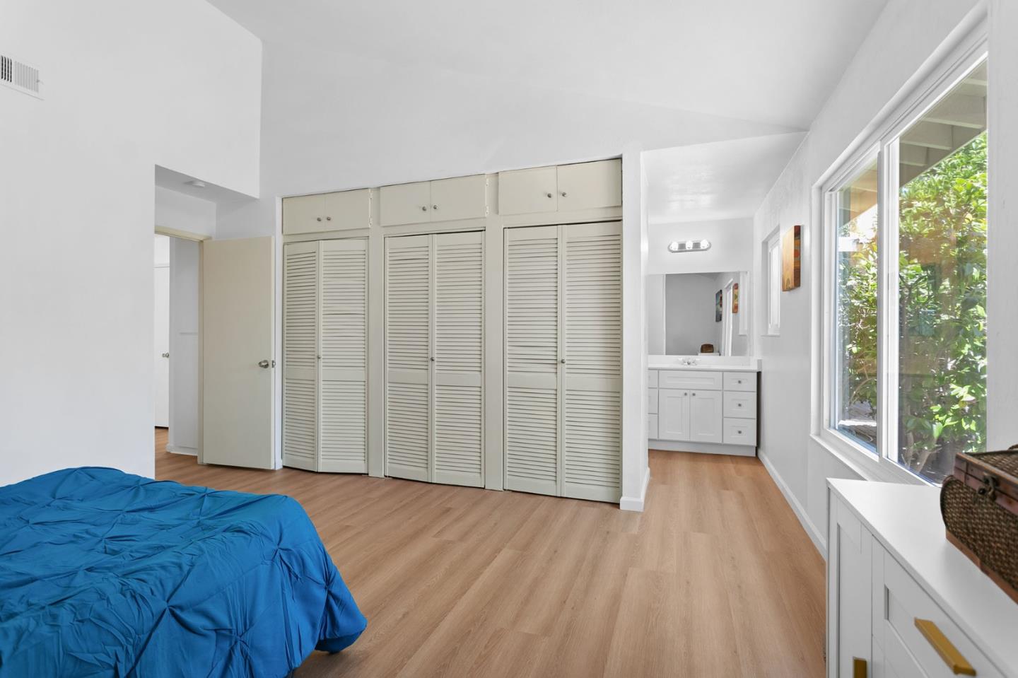 2962 Tuers Road San Jose, CA 95121 - Photo 21 of 38 a spacious bedroom with a bed and a view of bathroom