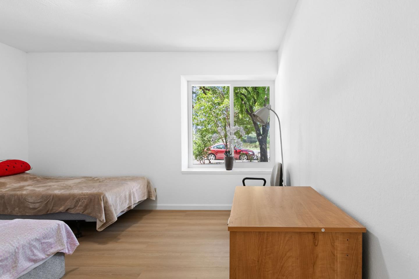 2962 Tuers Road San Jose, CA 95121 - Photo 26 of 38 a bedroom with two beds and a window