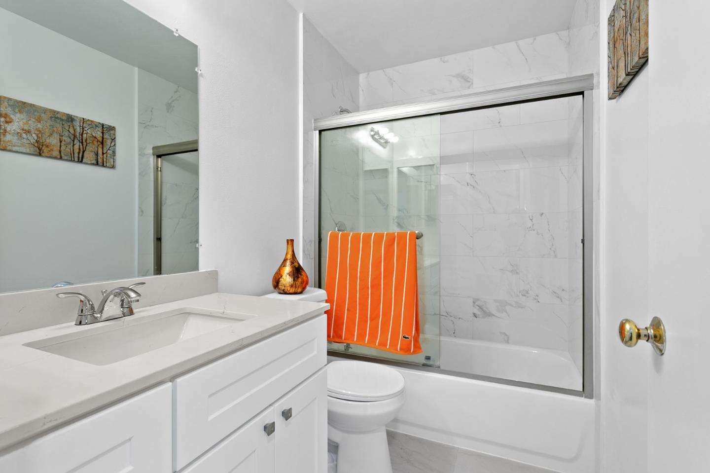 2962 Tuers Road San Jose, CA 95121 - Photo 28 of 38 a bathroom with a sink and a mirror