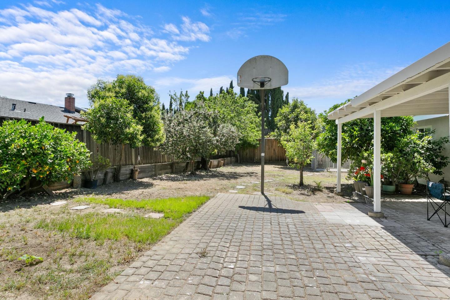 2962 Tuers Road San Jose, CA 95121 - Photo 37 of 38 a swimming pool with lots of tress in front of it