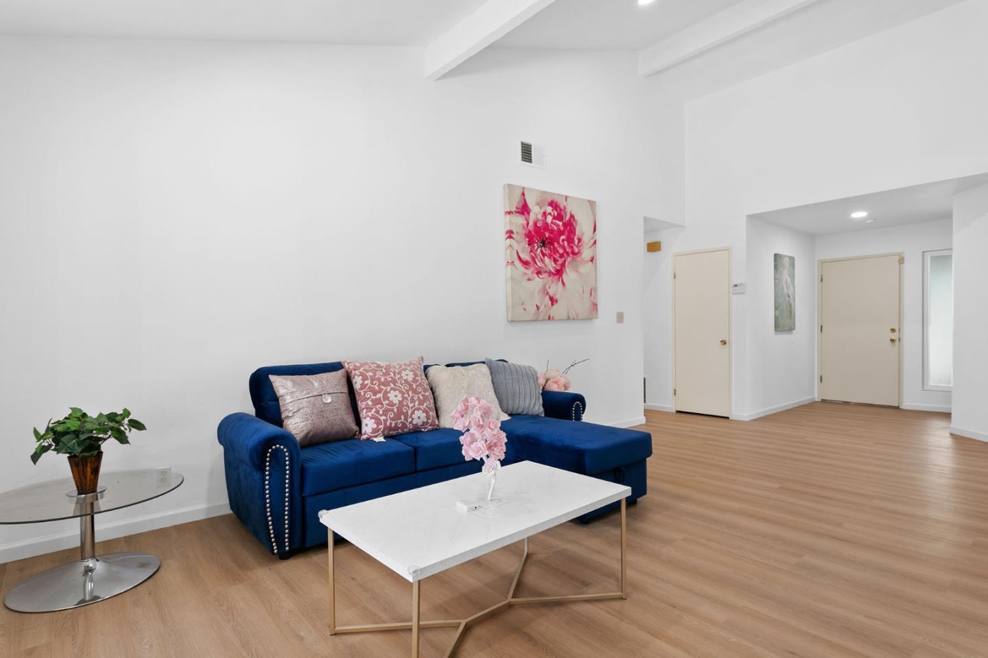 2962 Tuers Road San Jose, CA 95121 - Photo 6 of 38 a living room with furniture and a potted plant