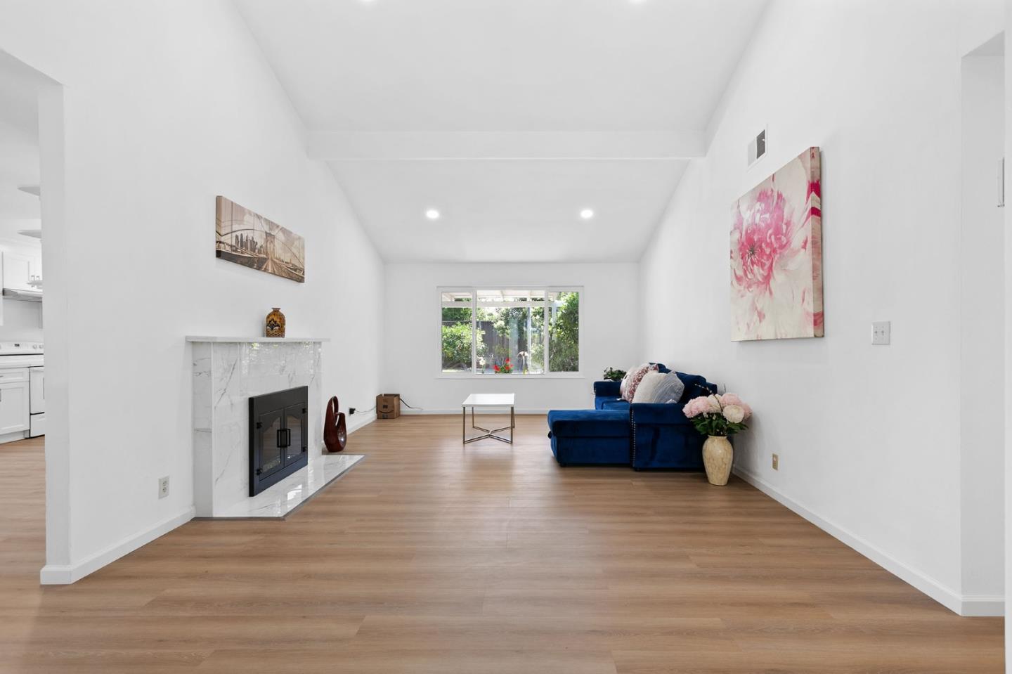 2962 Tuers Road San Jose, CA 95121 - Photo 7 of 38 a living room with furniture and a fireplace