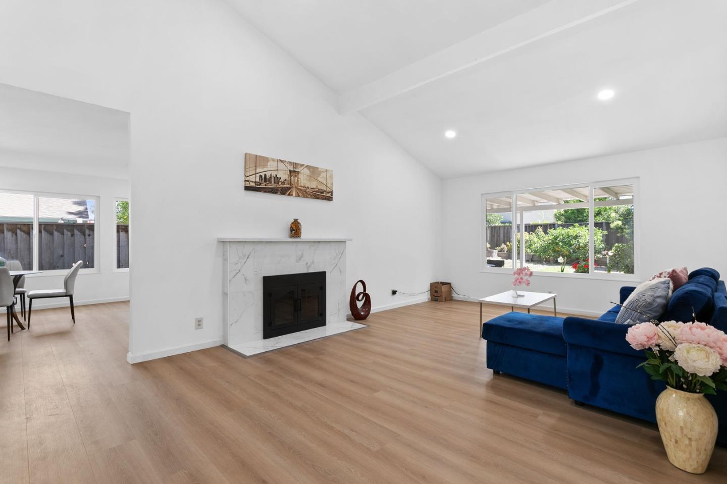 2962 Tuers Road San Jose, CA 95121 - Photo 8 of 38 a living room with furniture and a fireplace
