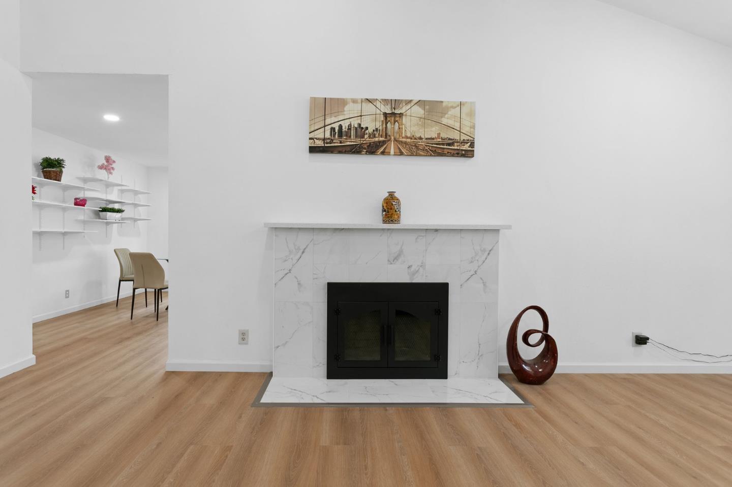 2962 Tuers Road San Jose, CA 95121 - Photo 10 of 38 a view of a livingroom with furniture and a fireplace