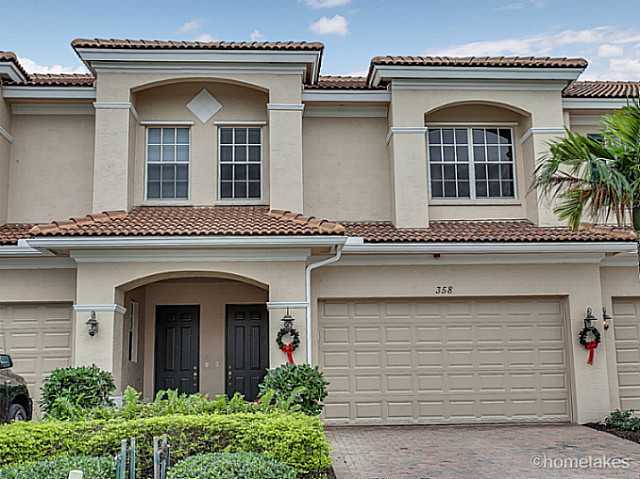 358 Southwest Walking Path Stuart, FL 34997 - Photo 1 of 22 front view of a house