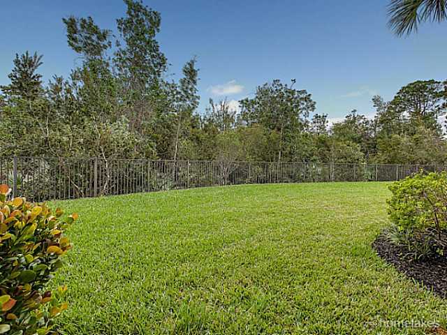 358 Southwest Walking Path Stuart, FL 34997 - Photo 18 of 22 a view of yard with a yard