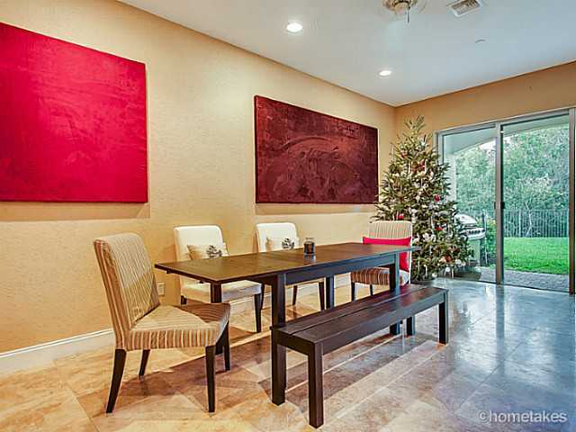358 Southwest Walking Path Stuart, FL 34997 - Photo 5 of 22 a reading room with furniture and a large window