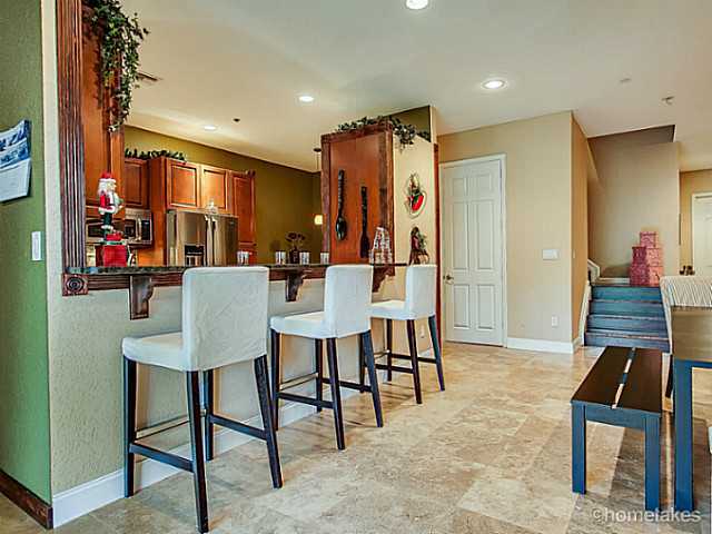 358 Southwest Walking Path Stuart, FL 34997 - Photo 6 of 22 a view of a dining room with furniture
