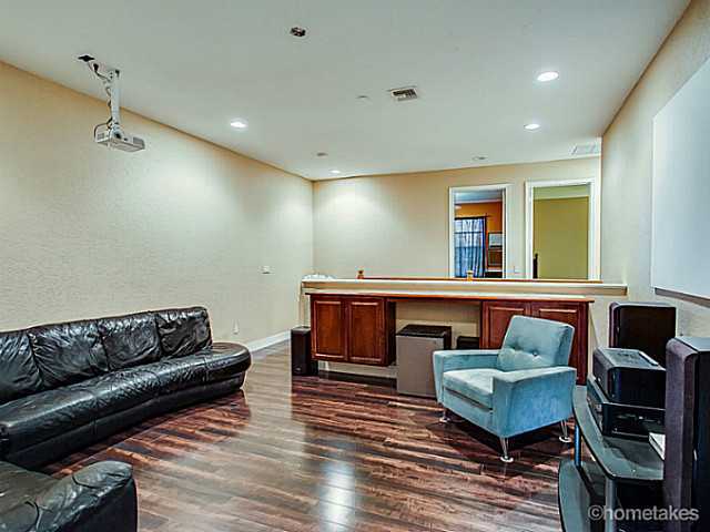 358 Southwest Walking Path Stuart, FL 34997 - Photo 10 of 22 a living room with furniture and a wooden floor