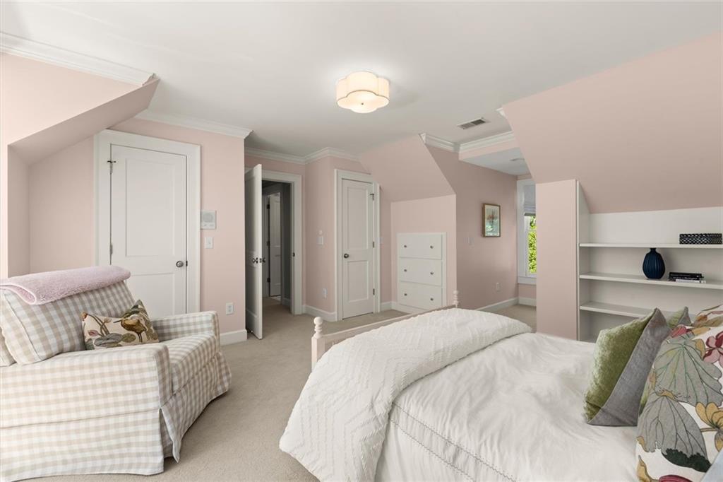 1450 Acworth Due West Road Northwest Kennesaw, GA 30152 - Photo 41 of 77 a spacious bedroom with a bed and a couch