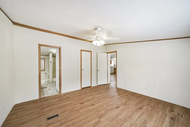 a view of a livingroom with wooden floor