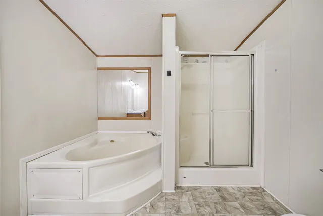 a white bath tub sitting in a bathroom