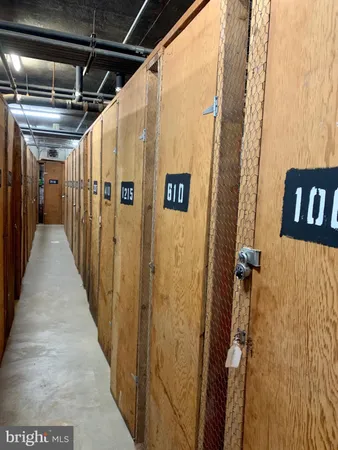 a view of a street with tall buildings